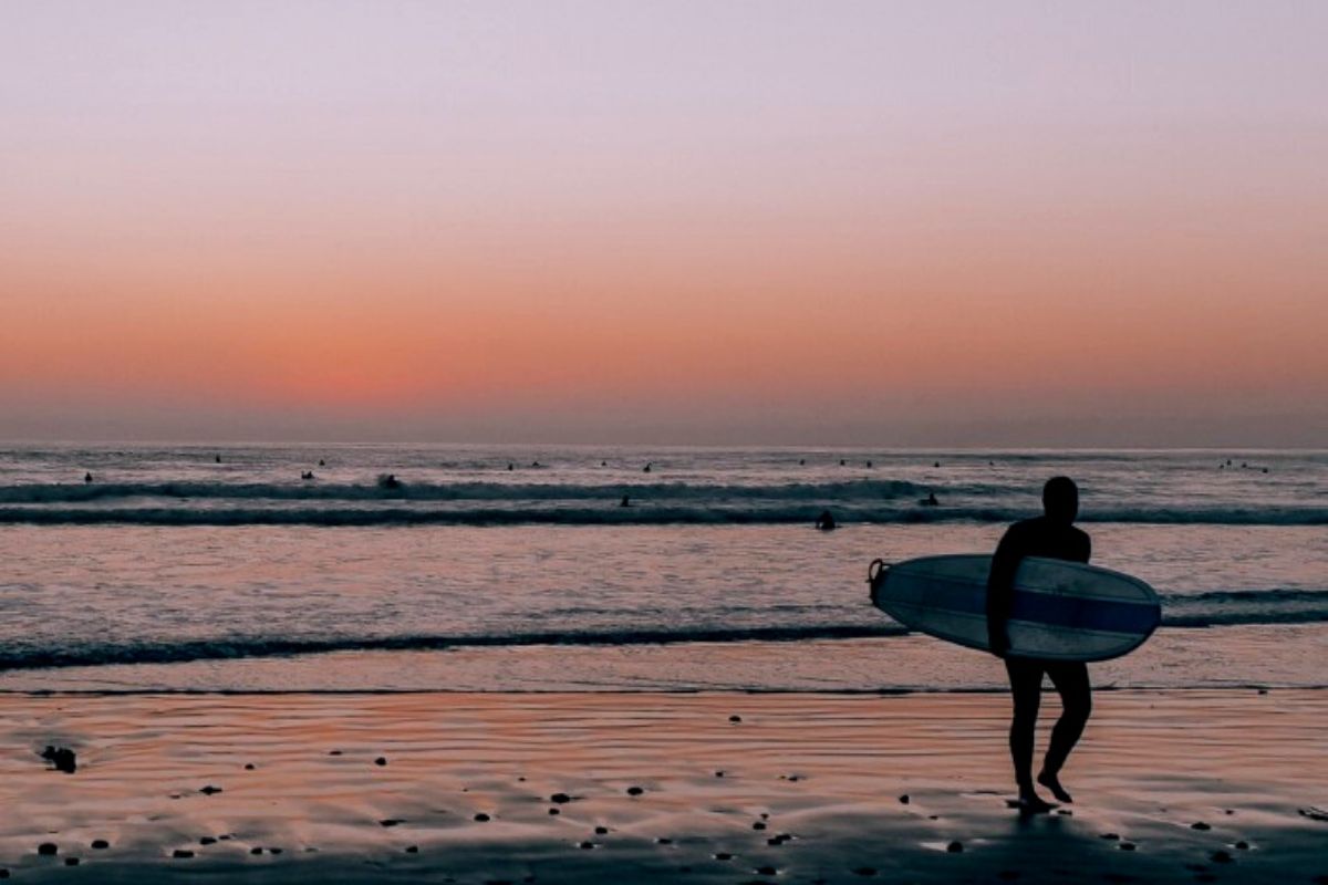 Tourmaline beach with surfer, best beaches in San Diego
