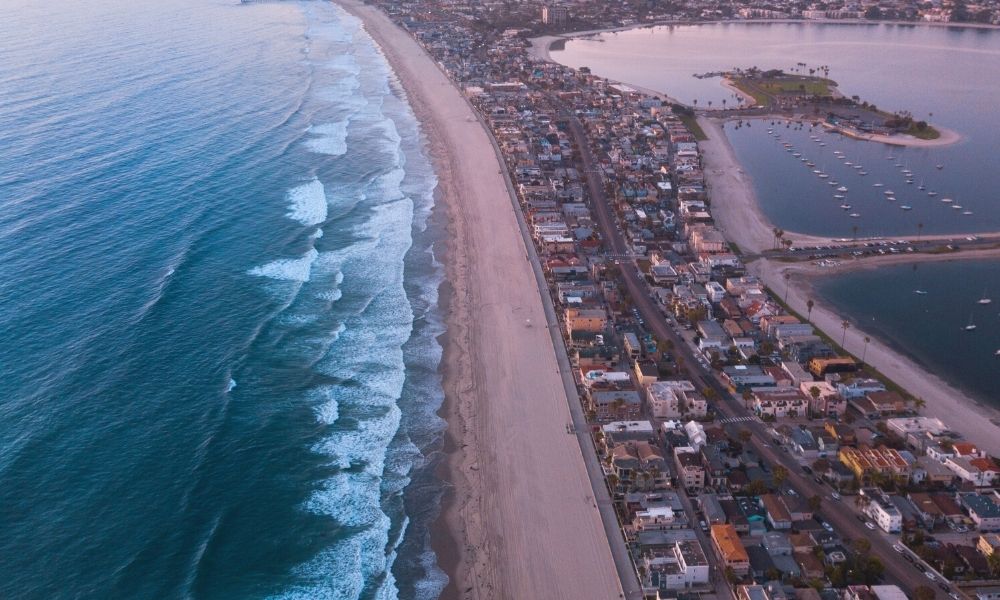 Mission Beach in San Diego at sunset aerial view, Moving to San Diego from another state